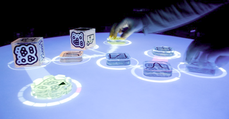 Illustration for article titled ReacTable Synth Makes Touchy-Feely Music for your Eyes